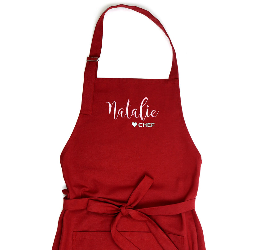 Dark red personalized men's apron with embroidered name