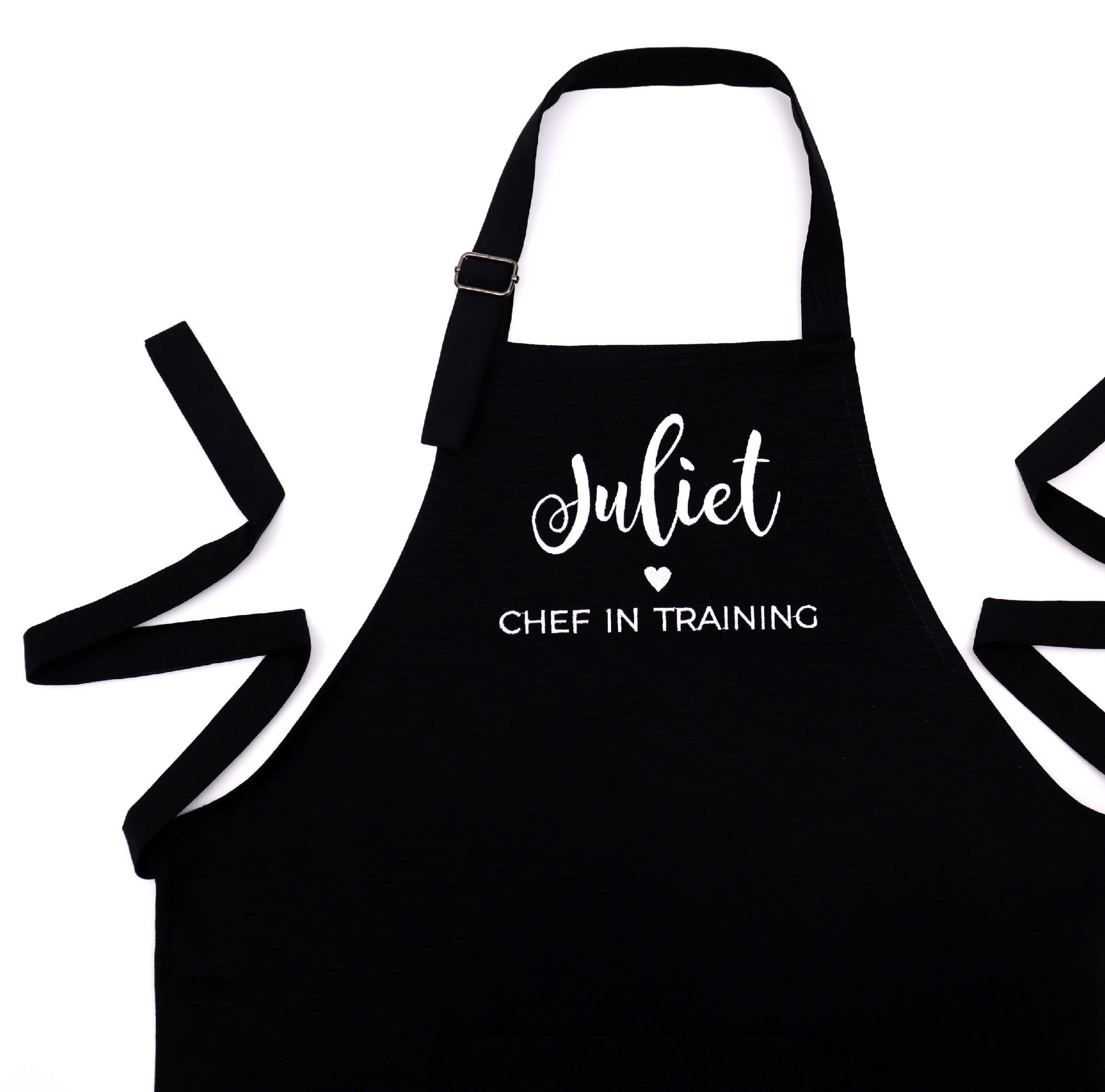 Personalized black apron for boys with embroidered name and 'Chef in Training' design"