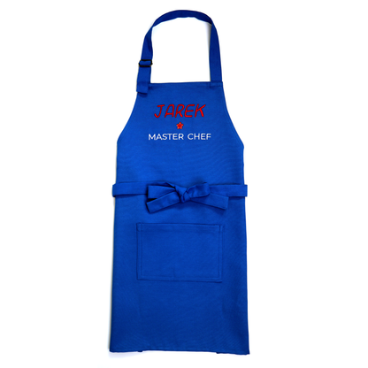 Personalized royal blue apron with a tied bow and front pocket, embroidered "Jarek ★ Master Chef"
