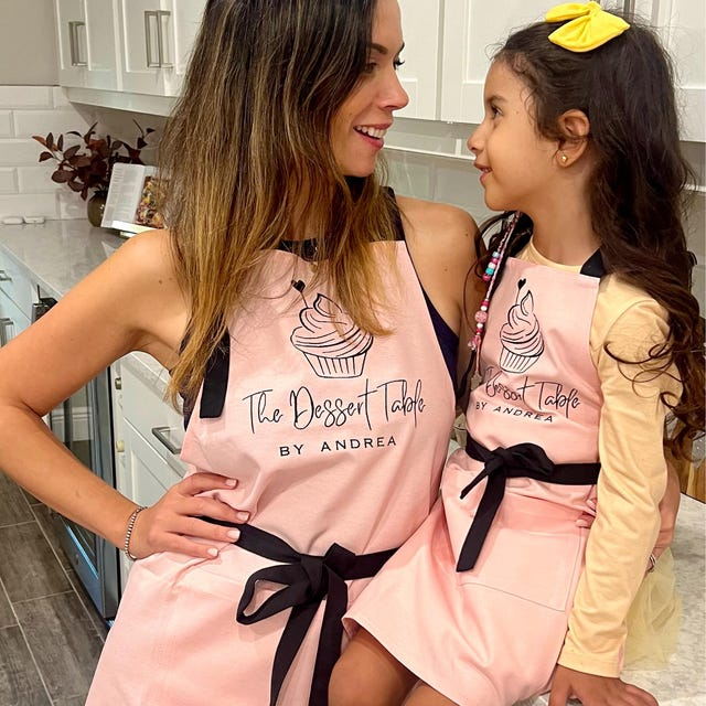 Personalized mommy and me matching aprons — mother and daughter cooking together